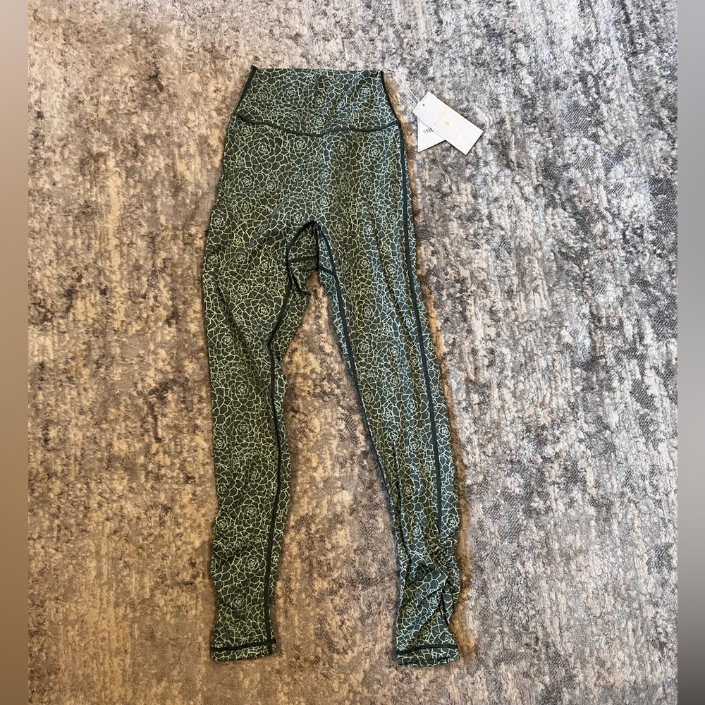 Green leggings